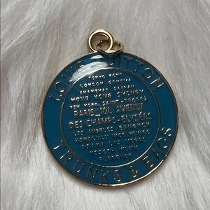 Louis Vuitton Teal and Gold Medallion